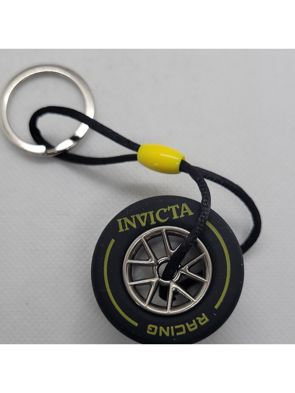 Invicta Racing Tire Wheel Keychain Black Yellow Collectible